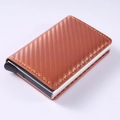 Slim RFID carbon fiber wallet in brown finish with automatic pop-up aluminum card slot - Carbon Fiber Orange