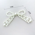Detail view of pearl bow hair accessory with 55mm and 65mm size dimensions shown - 5810 Wide Leg Bow