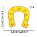 Detailed view of yellow horseshoe embroidery patch with size dimensions and weight info - Style 31 (Horshoe Clover)