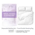 Disposable double travel bedding set in white includes sheet duvet cover and pillowcase - Double Sleeping Bag / White