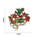 Detailed macro view of 4.6cm Christmas bell brooch with enamel holly and golden plating - Double Bells