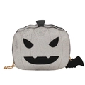Sparkling silver pumpkin-shaped crossbody bag with black Jack-o'-lantern face and bat charm - Sequin Silver