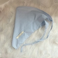 Detail of blue and white gingham headscarf with ties and Cheese Mood label - Light Blue Plaid Bandana / Light Blue