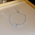 Detailed view of silver zircon pearl bracelet with adjustable drawstring closure - 62# Bracelet-Silver Rhinestone-Round Main Stone