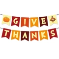 Nahaufnahme des GIVE THANKS Banners mit Truthahn- und Kürbismotiven für Thanksgiving - Truthahn Kürbis Stil