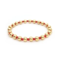 Minimalist 18K gold and red beaded elastic bracelet with polished metallic finish - Gold+Red