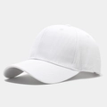 Detail of the twill fabric and curved brim on a minimalist white baseball cap - Adjustable / White
