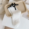 White cotton mid-calf socks with black ruffled edges and silk bows in vintage style - One Size / White