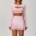 Pink two-piece yoga set with long sleeve cutout crop top and pleated mini skirt - S / Top And Bottom / Long Sleeve And Skirt / Peach Pink