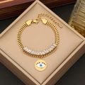 Golden double-layer evil eye necklace with zircon stones on a beige jewelry display box - Zirconia Evil Eye Bracelet (2# Bracelet)