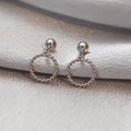 Silver stainless steel stud earrings featuring a twisted hoop charm and polished sphere - Silver Twisted Hoop Stud