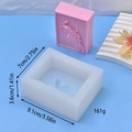 Detail view of rectangular silicone mold with peacock flower relief and product dimensions - Peacock