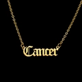 Detailed close-up of golden Gothic Cancer constellation letter pendant with O-chain - Cancer - Gold