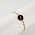 Gold stainless steel bracelet with black enamel round pendant featuring initial letter P - Letter P / Gold/Black