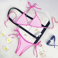 Pink two-piece bikini set with hot pink trim and side-tie bottoms on white sand - Light/Dark Pink