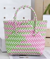 Detail of pink and green woven basket bag featuring geometric wave patterns and dual handles - Medium (No Bow) / Pink and Green