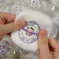 Juguete antiestrés de bola de yogur blanca apretada en un empaque transparente - Pan de Yogur Fluido
