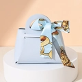 Elegant light blue-grey leather wedding favor bag with decorative printed silk scarf - Light Blue