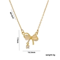 Collana a fiocco dorata con pietra occhio di gatto a cuore e pendente in zirconia - Stile Fiocco Occhio di Gato Oro (588 Collana Fiocco Cuore Pietra Occhio di Gatto)