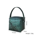 Detail view of the green marble pattern on the synthetic leather makeup organizer - Square Handheld Bag (X-216) / Dark Green