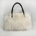 Faux fur tote bag in white with black tips and arched handles on a clean white background - White with Black Tips