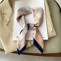 Champagne and navy blue satin scarf with geometric pattern tied on a magazine - Beige Striped Hair Scarf / 65