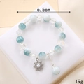 Blue gradient crackle bead bracelet with snowflake charm and 6.5cm diameter display - Blue And White Crackle Beads (Octagram Charm) (K3634)