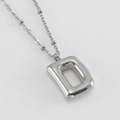 Minimalist silver bubble letter D pendant necklace in 18K stainless steel finish - Letter D / Steel