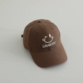 Detail of white embroidered winking smiley face and Laughty text on brown canvas cap - 52-54cm (3-8 Years) / Coffee