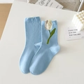 Light blue crew socks with elegant tulip embroidery on a clean white background - One Size / Blue