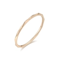 Close-up of 1mm rose gold ring with faceted geometric diamond-cut texture details. - Size 5 / Diamond Cut / 1mm / Rose Gold