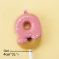 Pink donut shaped number 9 birthday candle with gold glitter accents and plastic stick - Chocolate Number 9 / Pink