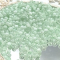 Macro shot of 10mm light green cracked glass beads for DIY jewelry making accessories - 8mm Semi-white Light Green