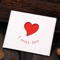 White greeting card with hollow heart design and I miss you text on wooden background - Type 306# Heart Hollow-I miss you (With Envelope)