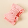 Detailed view of pink knitted double-layer bow headband with soft stretch fabric - Peach Pink