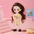 Movable doll toy with curly brown hair in a yellow tulle dress with puppy patterns - Yellow Vest Dress Girl