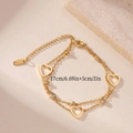 Detail view of double-layer stainless steel bracelet with heart charms and white zircons - Heart Double Layer Bracelet
