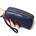 Navy blue snakeskin leather clutch bag with three gold zippers and wristlet strap - Royal Blue