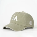 Detail showing the white LA embroidery and washed olive green fabric of the baseball cap - One Size / Light Khaki
