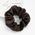 Detailed view of dark brown satin hair scrunchie with a glossy silk texture on a white plate - Chestnut (Large)