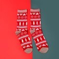Christmas themed crew socks with red holiday patterns and grey reinforced heel - Snowflake/Heart