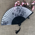 Classic folding fan with black ink floral print, dark ribs and elegant tassel charm - No.01 Black Ink Floral