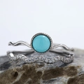 Close-up of S925 silver wave rings set with natural turquoise and sparkling zircon stones - Platinum + Natural Turquoise