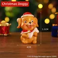 Miniature Christmas dog figurine wearing a festive red hat and cape holding a bone - Dog