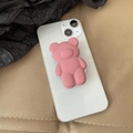 Pink matte bear expandable phone socket grip attached to a white smartphone case - Transparent Stand / Rose Pink 3D Bear