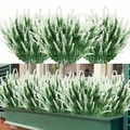 Detail of white artificial lavender plants in window box and individual stems display - White