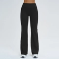 Women's black high-waisted flared yoga pants with ribbed texture and slimming fit - XL / Premium Black