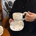 Irregular white ceramic coffee cup and saucer set with black polka dots and bows - Black Bow Tie Cup & Saucer Set / Cup + Saucer Set