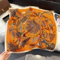 Detail view of the orange silk-like square scarf featuring mythological animal prints - Orange Red (W-486)
