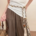 Detail of bohemian hand-woven waist chain with crystal beads and tassels on linen dress - White Braided Beaded Tassel Waist Chain